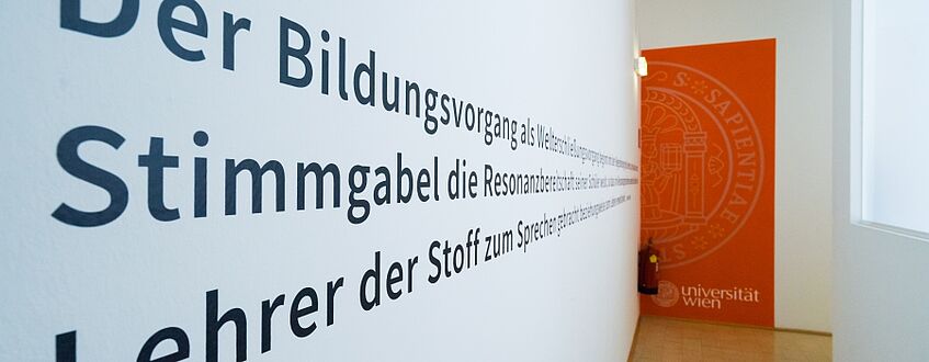 hallway at the Center for Teacher Education with University logo and wall design 